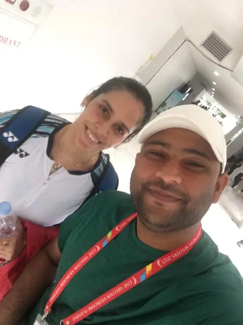 Dr. M Mahammad Ilias with an international badminton athlete at Indonesia Masters 2023